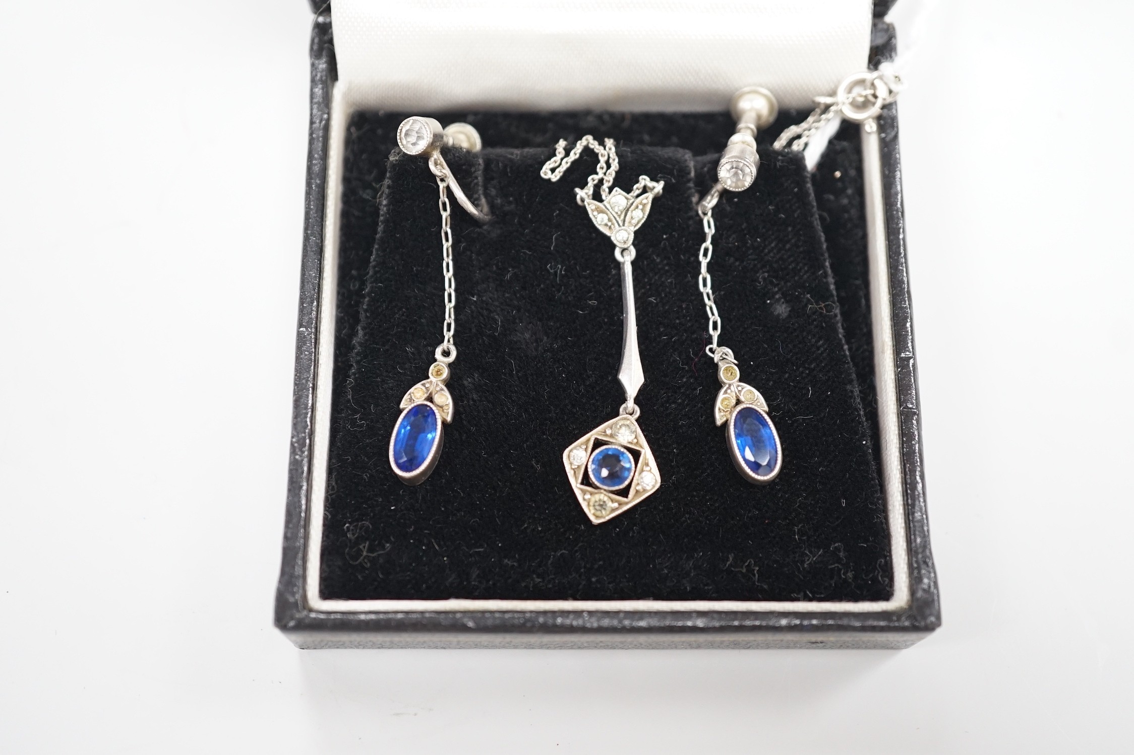 A 1920's? continental 935 white metal and two colour paste set pendant necklace, 49cm and a pair of matching drop earrings.
